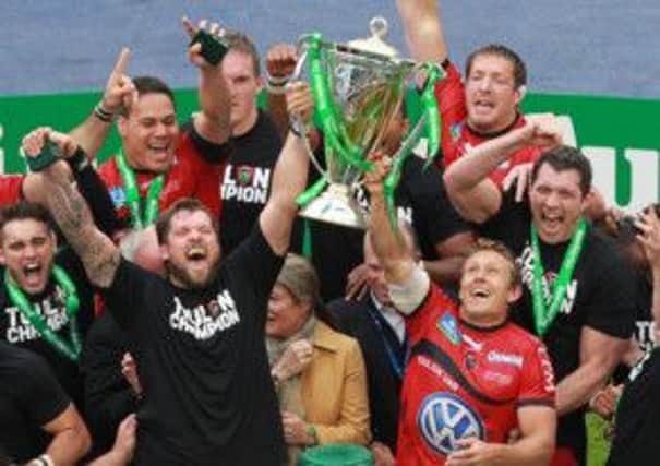 Jonny Wilkinson, who added the winning extras for Toulon, joins the celebrations. Picture: AFP/Getty