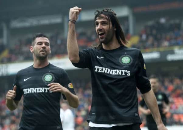 Celtic's Georgios Samaras, right, celebrates his second goal of the match. Picture: SNS