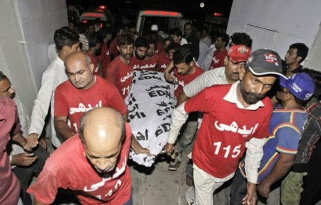 The body of Zahra Shahid Hussain is taken to a Karachi hospital. Picture: AP Photo