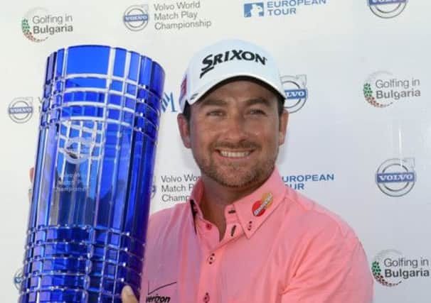 Graeme McDowell raises his trophy after winning the Volvo World Match Play Championship. Picture:Getty