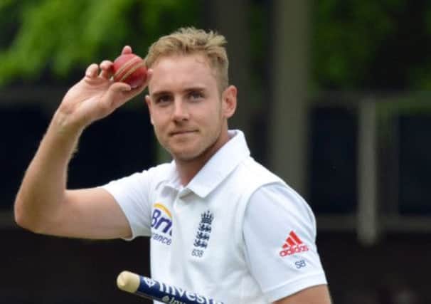 Complete with stump and match ball, Stuart Broad salutes the crowd after Englands win. Picture: PA