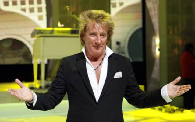 Rod Stewart celebrates his album Time reaching the number one spot. Picture: PA