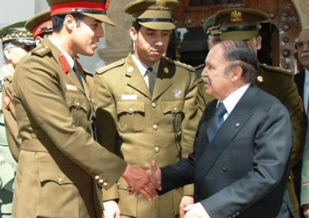 Abdelaziz Bouteflika (right) has not been seen in public for a while. Picture: AP