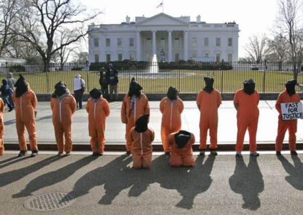 Human rights activists outside the White House in 2011. Picture: AP