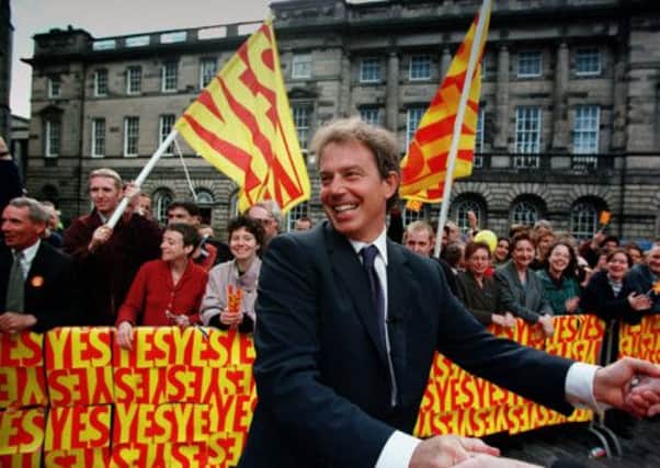 Tony Blair celebrates with voters in Parliament Square, Edinburgh, after Scotland voted Yes/Yes vote in 1997. Picture: Allan Milligan