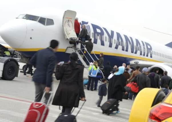 Passengers board a Ryanair flight. Picture: Getty/AFP
