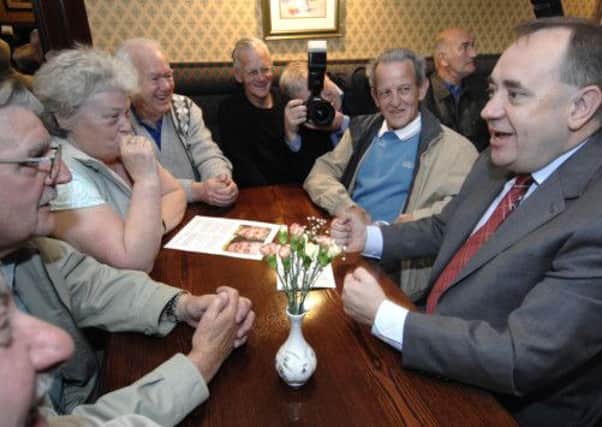 Alex Salmond speaks to pensioners in Bannockburn, Stirling in 2011. Picture: Ian Rutherford