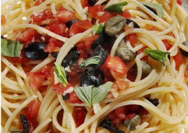 Fresh tomato, black olive and caper pasta. Picture: Paul Dodds