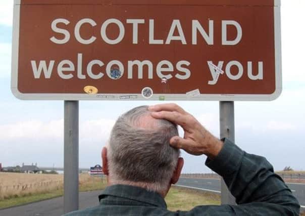 Scotland welcomes you  but for how long will it be easy just to step over the border? Picture: Neil Hanna