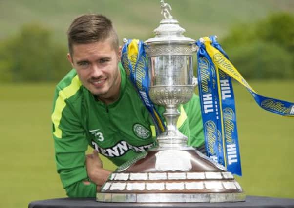 Celtic defender Mikael Lustig with the Scottish Cup trophy. Picture: SNS