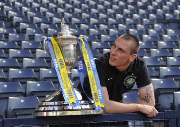 Celtic captain Scott Brown yesterday defended teammate Kris Commons retirement from international football.  Picture: Robert Perry