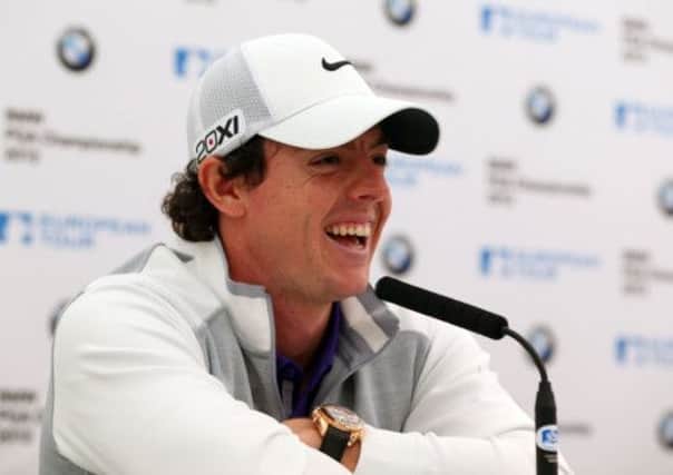 Rory McIlroy has a laugh ahead of the BMW PGA Championship at Wentworth yesterday, but he was still reluctant to expand on his situation with Horizon Sports. Picture: Getty