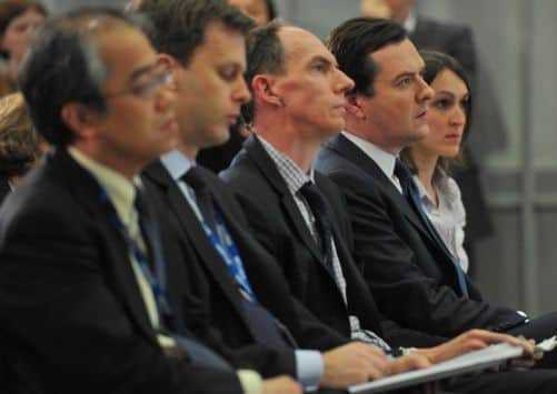 George Osborne attends an IMF press conference today. Picture: Getty