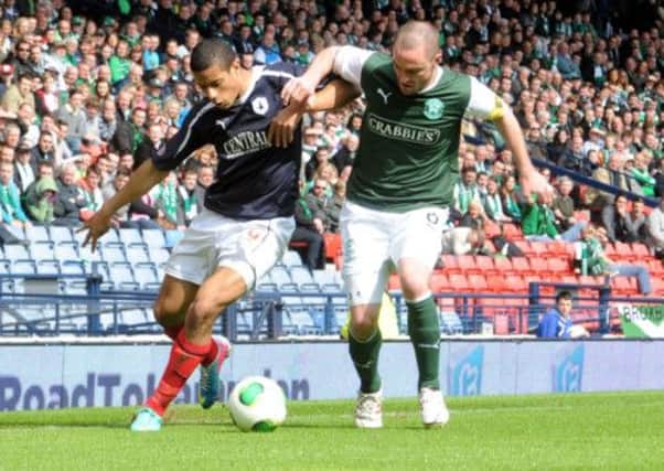 James McPake tussles for the ball with Falkirks Lyle Taylor during Hibs triumphant William Hill Scottish Cup semi-final at Hampden Park last month. Picture: Lisa McPhillips