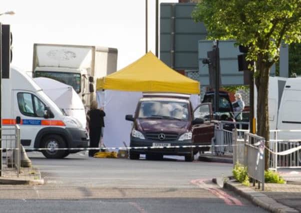 Police forensics tents and officers are seen in Woolwich, east London. Picture: Getty