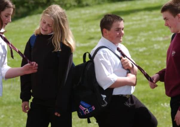Preston Lodge High School pupils size up each other's uniforms. Picture: TSPL