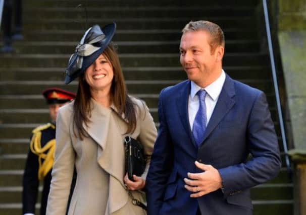 Olympic hero Sir Chris Hoy leaves the Church of Scotland General Assembly, with wife Sarah. Picture: HeMedia