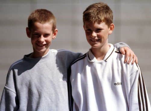 Brothers Andy Murray and Jamie Murray compete in the Under 12's Scottish Tennis Team. Picture: Julie Bull