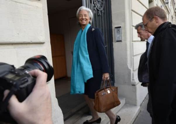 Christine Lagarde arrives at court with her lawyer. Picture: Getty