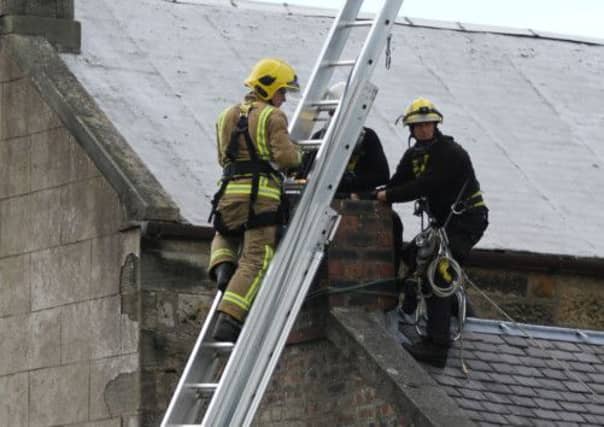 Rescuers try to communicate with the trapped boy. Picture: Dave Taylor/Stockpix.eu