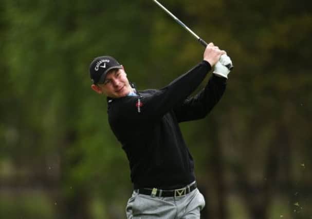 Scott Henry plays a shot at the ninth hole Wentworth yesterday. Picture: Getty