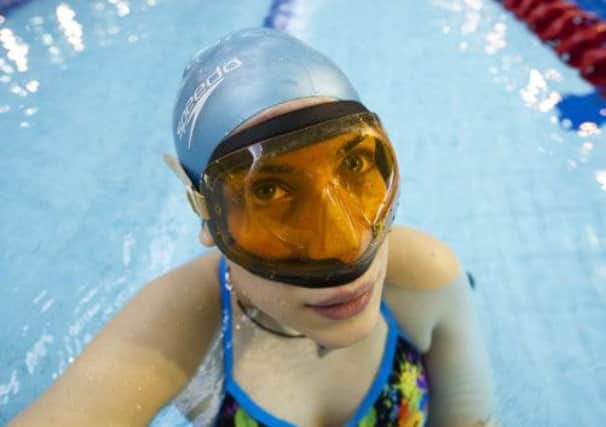 Maria Gasoula tries out the pool at the refurbished Tollcross International Swimming Centre. Picture: SNS