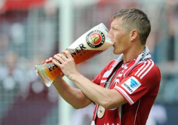 Bastian Schweinsteiger hopes to drink to more Bayern success in the Champions League final. Picture: AP