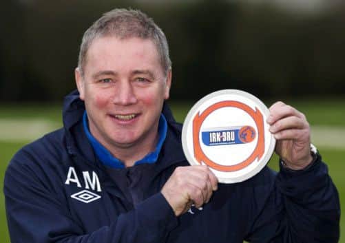 Ally McCoist was recognised for steering Rangers through choppy waters to the title. Picture: SNS