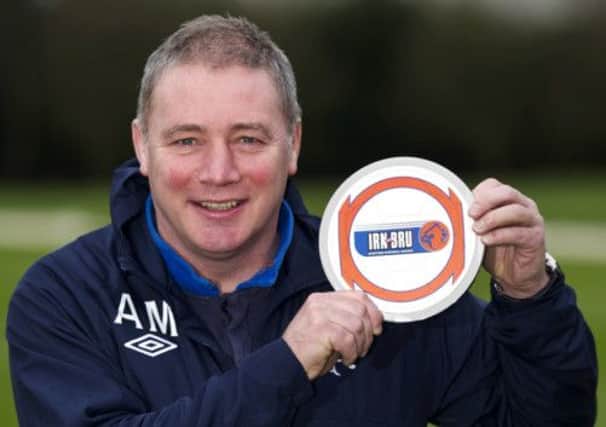 Ally McCoist was recognised for steering Rangers through choppy waters to the title. Picture: SNS