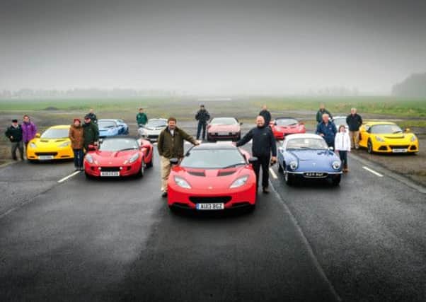 The Evora S Sports Racer leads the line of Lotus cars on the main straight at Charterhall