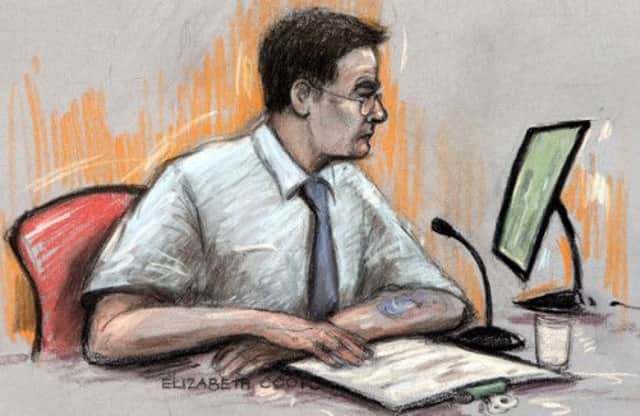 Courts artist impression of Mark Bridger looking at images that were found on his laptop. Picture: Elizabeth Cook/PA