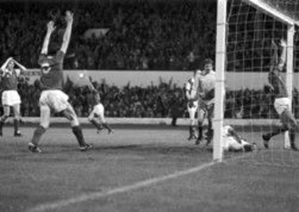 Arthur Duncan sprawls on the Hampden turf after his own goal handed Rangers a 3-2 victory in the second replay of the 1979 final. Picture: Allan Milligan