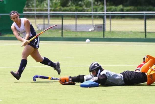 Sam Judge scores for Scotland in an internationa match against the US in the World League in Brazil. Picture: Pedro Monteiro
