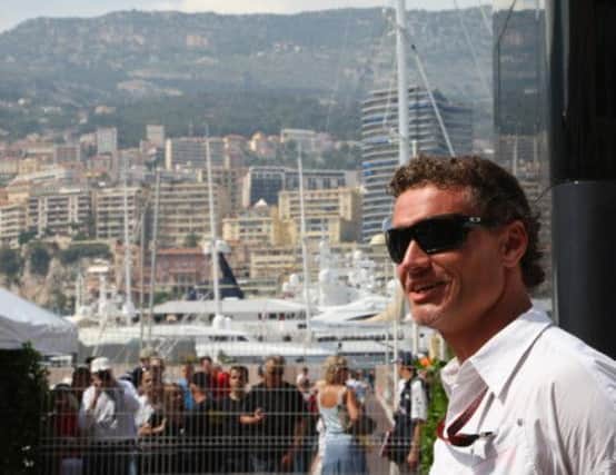 David Coulthard in the paddock of the Monaco racetrack in 2007. Picture: Getty