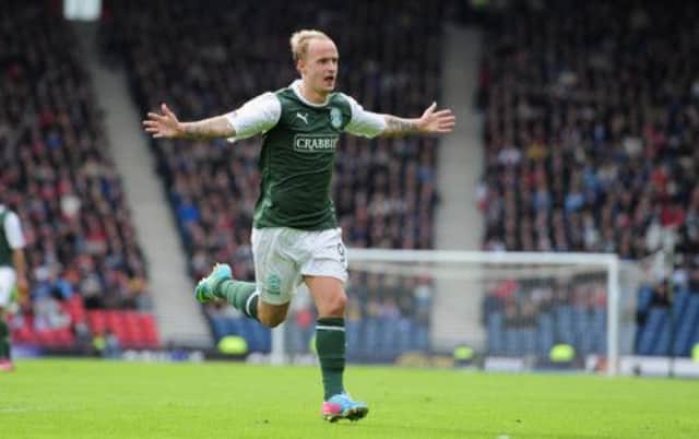 Leigh Griffiths celebrates the winning goal for Hibernian during The William Hill Scottish Cup Semi Final. Picture: SNS