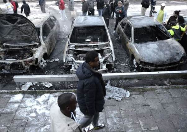 Cars burnt out in the rioting. Picture: Getty