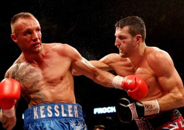 Carl Froch and Mikkel Kessler trade blows. Picture: Getty