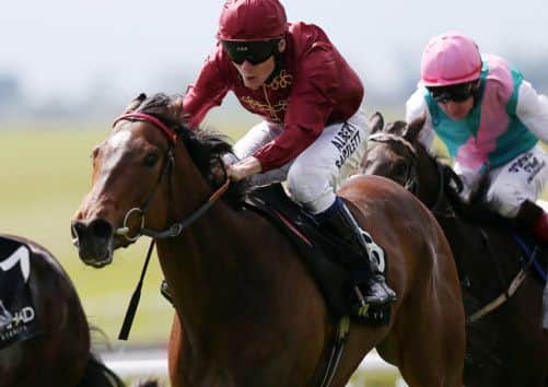Just The Judge under jockey Jamie Spencer wins the Etihad Airways Irish 1000 Guineas. Picture: PA