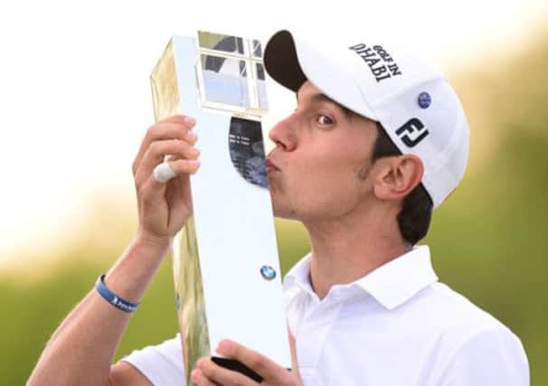 Italy's Matteo Manassero with the BMW PGA Championship trophy. Picture: PA