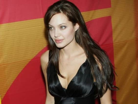 Angelina Jolie's aunt Debbie Martin has died from breast cancer. Jolie, pictured, recently announced she had a double mastectomy. Picture: AP