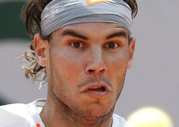 Rafael Nadal of Spain eyes the ball. Picture: Reuters