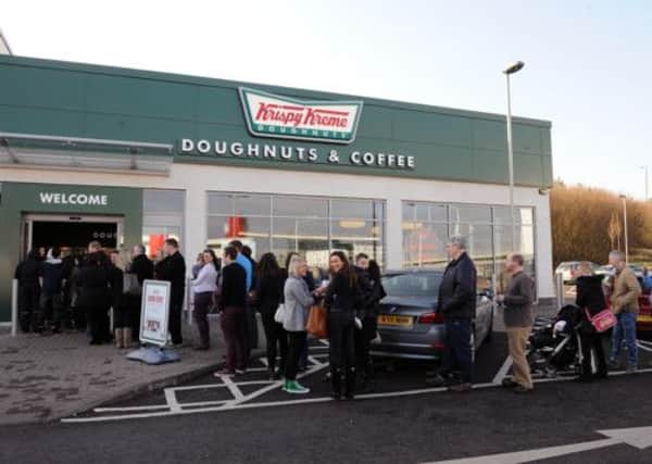 Krispy Kreme in Edinburgh. Strong performance from businesses such as this helped the service sector rebound. Picture: TSPL