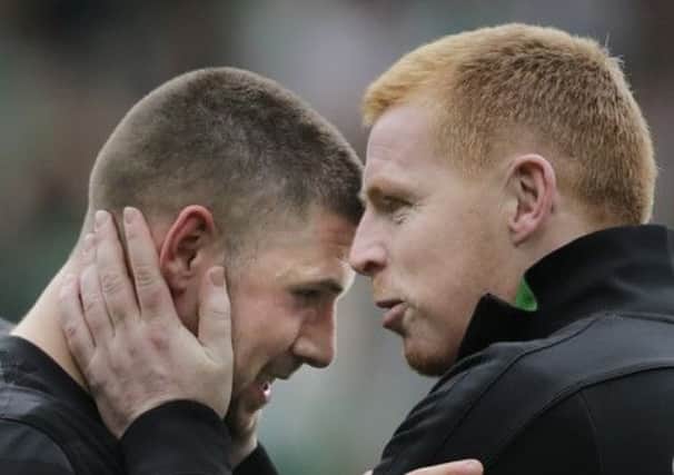 Hooper and Neil Lennon celebrating Sunday's Scottish Cup final win. Picture: PA