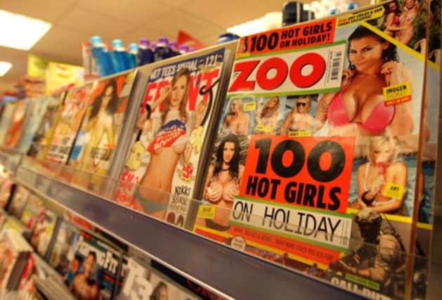 Copies of so-called 'lads mags' can be found in newspapers and supermarkets across the UK. Picture: PA