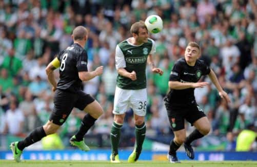 Hibs' Kevin Thomson takes on Celtic. Picture: Jane Barlow