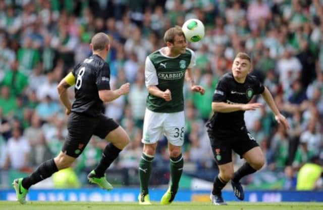 Hibs' Kevin Thomson takes on Celtic. Picture: Jane Barlow