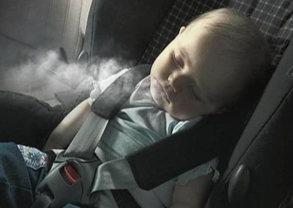 An image from an NHS campaign warning of the dangers of smoking near children. Picture: PA