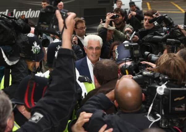 Max Clifford is mobbed by the press as he arrives at Westminster Magistrates court today. Picture: Getty