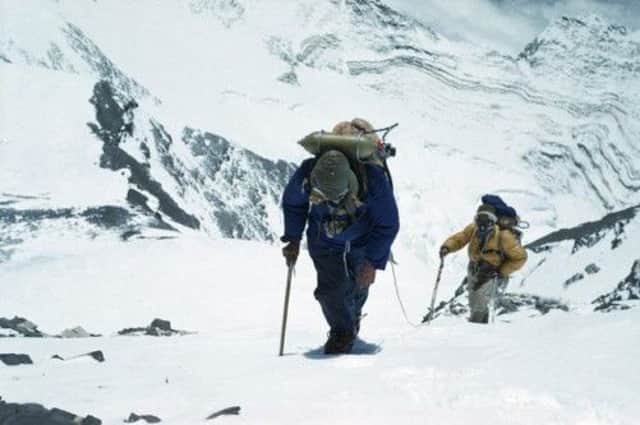 Tenzing and Hillary, foreground, on route to the top of the world. Picture: PA