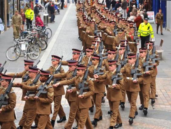 Soldiers from 1st Battalion Scots Guards (1SG) parade through Inverness to celebrate their return from Afghanistan. Picture: PA